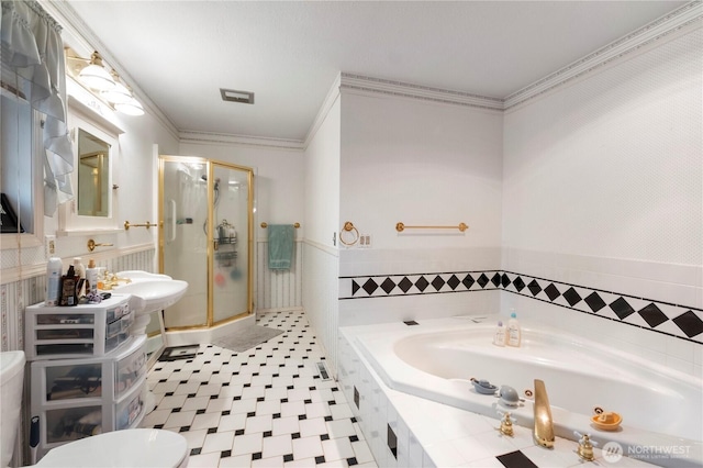 1487 Centralia Alpha Rd, Chehalis, WA 98532 - full bathroom with a whirlpool tub, a shower stall, toilet, crown molding, and a wainscoted wall
