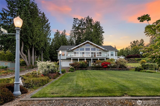 8151 E Seaview Dr, Port Orchard, WA 98366 - view of front of home with an attached garage, a front lawn, and a deck