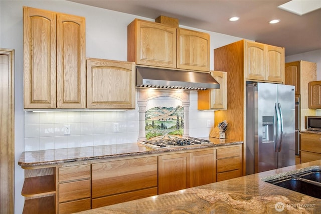8151 E Seaview Dr, Port Orchard, WA 98366 - kitchen with appliances with stainless steel finishes, under cabinet range hood, stone countertops, backsplash, and recessed lighting