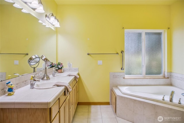 8151 E Seaview Dr, Port Orchard, WA 98366 - full bathroom with double vanity, tile patterned flooring, a bath, and baseboards