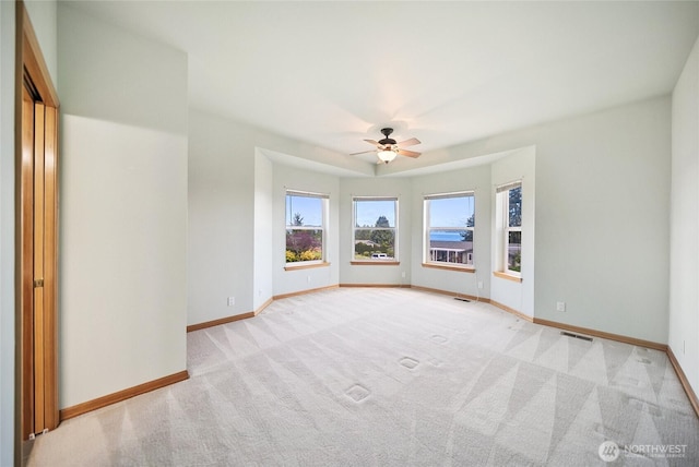 8151 E Seaview Dr, Port Orchard, WA 98366 - unfurnished room featuring light colored carpet, ceiling fan, and baseboards