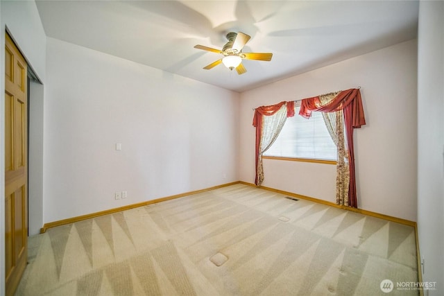 8151 E Seaview Dr, Port Orchard, WA 98366 - unfurnished room featuring light carpet, ceiling fan, and baseboards