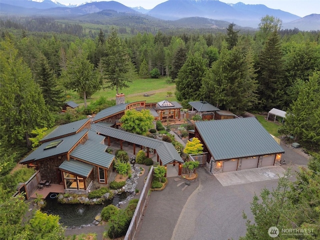 2734 Blue Mountain Rd, Sequim, WA 98362 - view from above of property featuring a heavily wooded area and a mountain backdrop