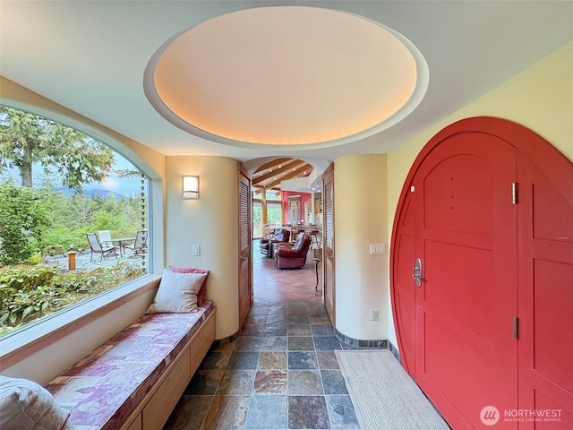 2734 Blue Mountain Rd, Sequim, WA 98362 - entryway with stone tile floors, baseboards, and a raised ceiling