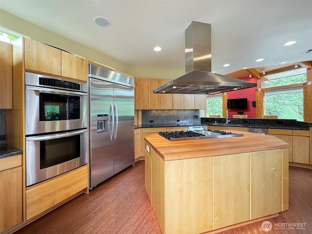 2734 Blue Mountain Rd, Sequim, WA 98362 - kitchen with stainless steel appliances, island exhaust hood, light brown cabinetry, wooden counters, and a sink