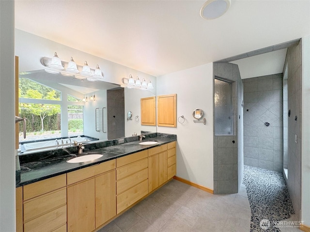 2734 Blue Mountain Rd, Sequim, WA 98362 - full bath with a walk in shower, double vanity, baseboards, and a tub