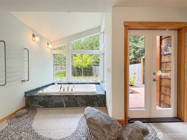 2734 Blue Mountain Rd, Sequim, WA 98362 - full bathroom featuring tile patterned flooring, a garden tub, baseboards, and lofted ceiling