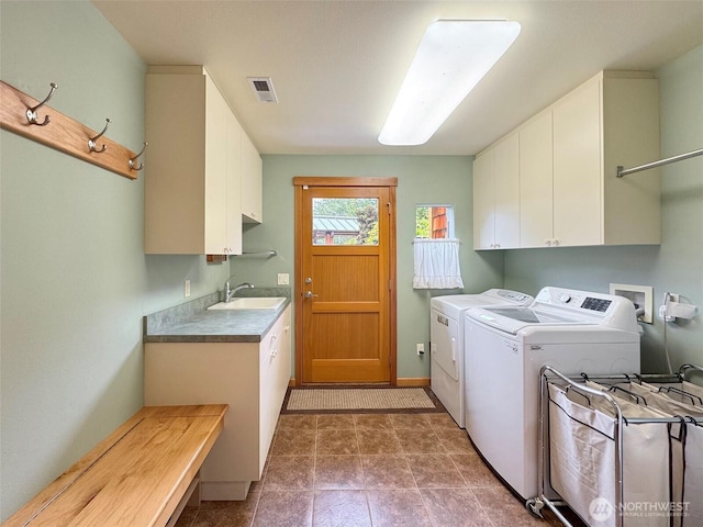 2734 Blue Mountain Rd, Sequim, WA 98362 - laundry area featuring cabinet space and independent washer and dryer