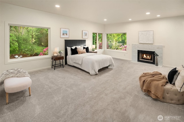 12909 Spanaway Loop Rd S, Tacoma, WA 98444 - bedroom featuring recessed lighting, carpet floors, baseboards, and a fireplace