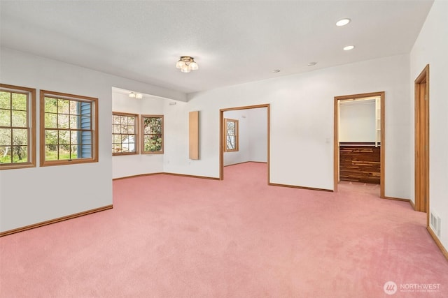 145 E Falcon Ct, Shelton, WA 98584 - unfurnished room featuring light carpet, baseboards, and recessed lighting