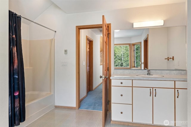 145 E Falcon Ct, Shelton, WA 98584 - full bath featuring vanity, shower / tub combo, baseboards, and tile patterned floors