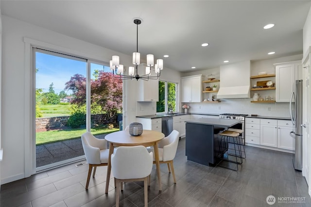 4844 Bridgeport Pl, Mukilteo, WA 98285 - dining space with a chandelier and recessed lighting