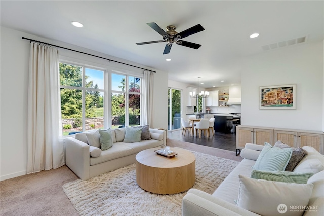 4844 Bridgeport Pl, Mukilteo, WA 98285 - living room with recessed lighting, a ceiling fan, a chandelier, and baseboards