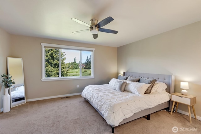 4844 Bridgeport Pl, Mukilteo, WA 98285 - bedroom with baseboards, ceiling fan, and carpet
