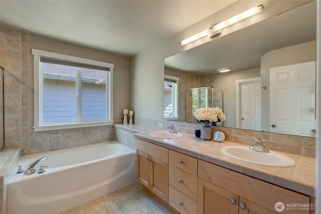 4844 Bridgeport Pl, Mukilteo, WA 98285 - full bath featuring double vanity, healthy amount of natural light, a bath, and a shower stall