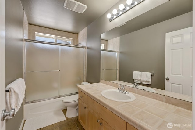 4844 Bridgeport Pl, Mukilteo, WA 98285 - full bath with toilet, vanity, enclosed tub / shower combo, and tile patterned floors
