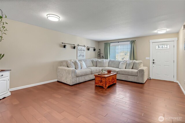 20003 13th Avenue Ct E, Spanaway, WA 98387 - living area with wood finished floors and baseboards