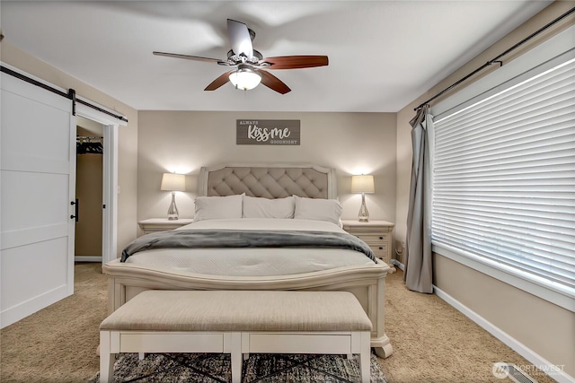 20003 13th Avenue Ct E, Spanaway, WA 98387 - bedroom featuring a barn door, light colored carpet, baseboards, and ceiling fan