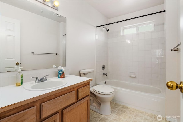 1733 NW 59th St Unit 201, Seattle, WA 98107 - full bath featuring vanity, washtub / shower combination, and toilet