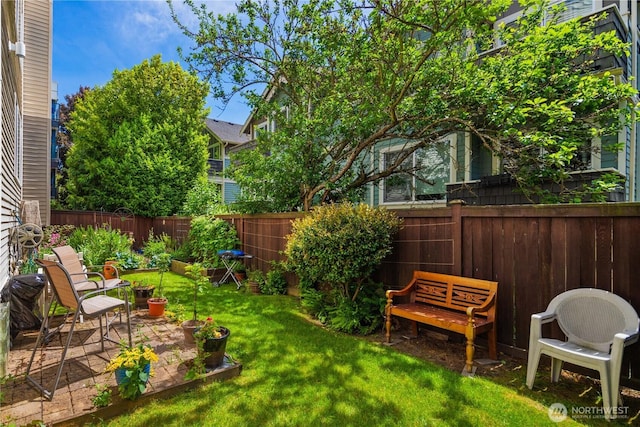 1733 NW 59th St Unit 201, Seattle, WA 98107 - view of yard with a patio