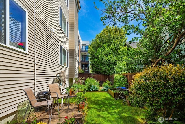 1733 NW 59th St Unit 201, Seattle, WA 98107 - view of yard with a patio area