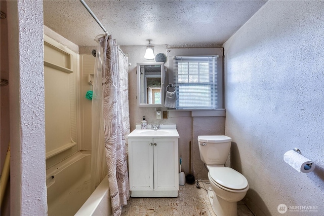 2150 N Callow Ave, Bremerton, WA 98312 - full bathroom with toilet, shower / tub combo, vanity, a textured ceiling, and a textured wall