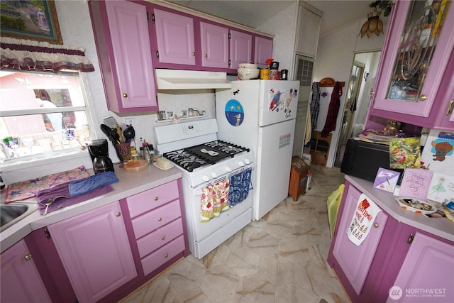 1710 254th St, Ocean Park, WA 98640 - kitchen featuring white appliances, under cabinet range hood, and light countertops