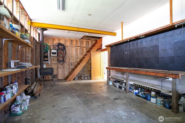 1669 Grandview Pl, Ferndale, WA 98248 - garage with a workshop area and a wood stove