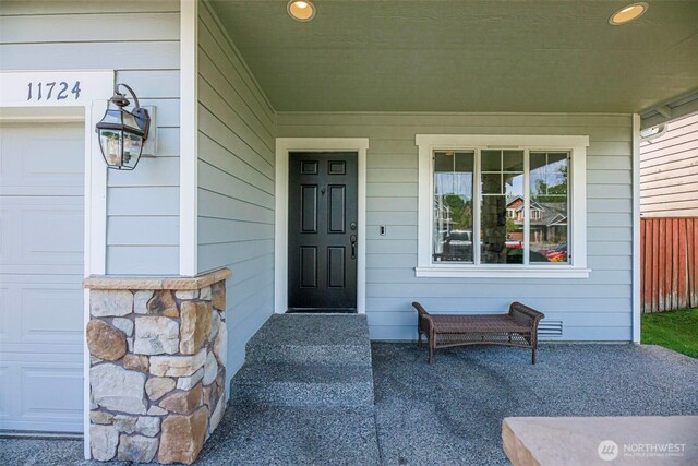 11724 1st Pl SE, Lake Stevens, WA 98258 - view of exterior entry featuring a porch
