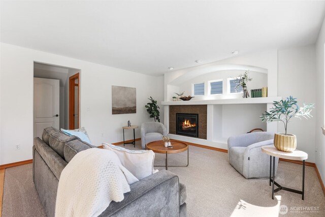 11724 1st Pl SE, Lake Stevens, WA 98258 - living area with a tiled fireplace and baseboards