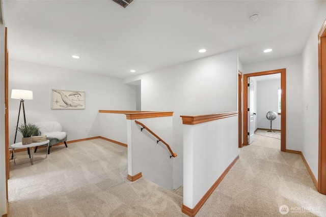 11724 1st Pl SE, Lake Stevens, WA 98258 - hallway with an upstairs landing, light colored carpet, recessed lighting, and baseboards