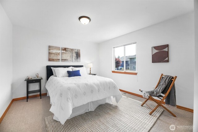 11724 1st Pl SE, Lake Stevens, WA 98258 - bedroom featuring baseboards and carpet flooring