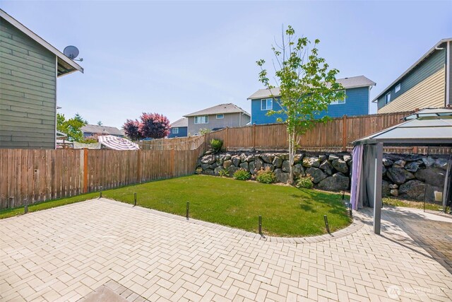 11724 1st Pl SE, Lake Stevens, WA 98258 - view of patio / terrace featuring a gazebo and a residential view