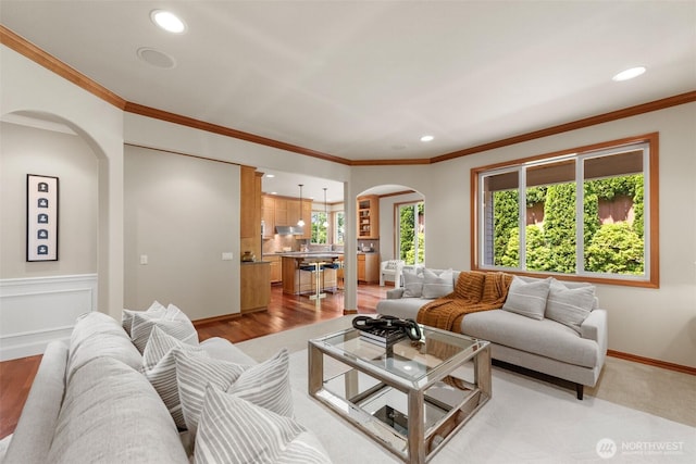 4105 215th St SE, Bothell, WA 98021 - living area with arched walkways, plenty of natural light, recessed lighting, ornamental molding, and baseboards