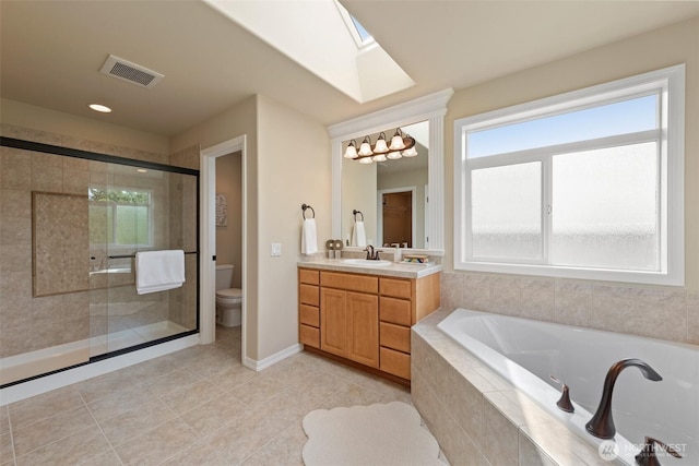 4105 215th St SE, Bothell, WA 98021 - bathroom with plenty of natural light, a garden tub, toilet, and vanity