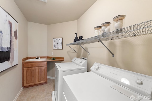 4105 215th St SE, Bothell, WA 98021 - washroom featuring washer and clothes dryer, cabinet space, and baseboards
