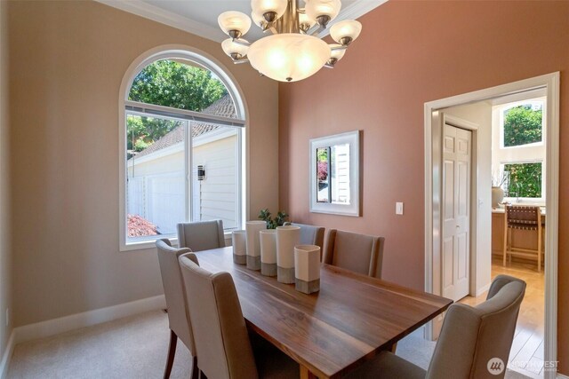 1653 204th Ave NE, Sammamish, WA 98074 - dining space featuring a chandelier, baseboards, and crown molding