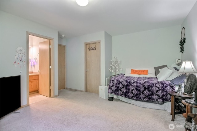 13502 215th Ave E, Bonney Lake, WA 98391 - bedroom with light carpet and ensuite bathroom
