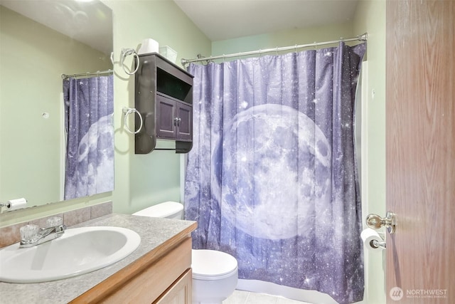 13502 215th Ave E, Bonney Lake, WA 98391 - bathroom featuring toilet, vanity, a shower with shower curtain, and tile patterned flooring