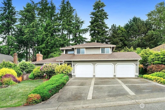 1112 SW 326th Pl, Federal Way, WA 98023 - view of front of house with driveway and an attached garage