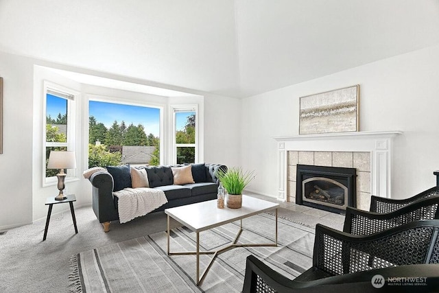1112 SW 326th Pl, Federal Way, WA 98023 - carpeted living room featuring a tile fireplace and high vaulted ceiling