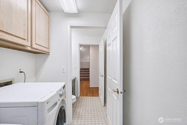 1112 SW 326th Pl, Federal Way, WA 98023 - laundry area featuring cabinet space, light floors, and separate washer and dryer