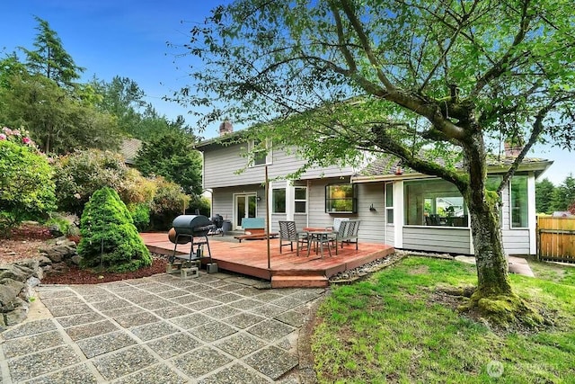 1112 SW 326th Pl, Federal Way, WA 98023 - back of property featuring a wooden deck and a chimney