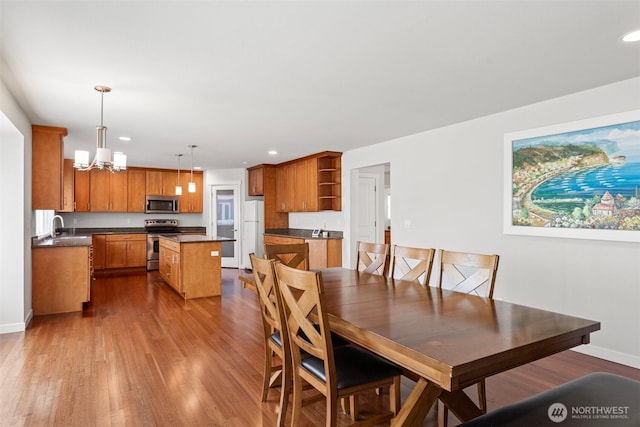 1120 156th Ave SE, Bellevue, WA 98007 - dining room with dark wood-style floors, a chandelier, recessed lighting, and baseboards