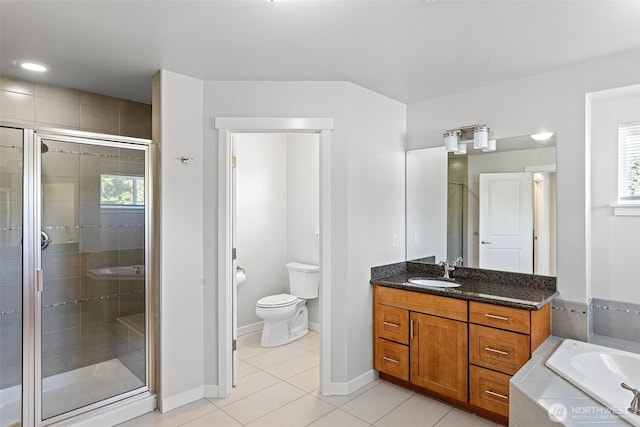 1120 156th Ave SE, Bellevue, WA 98007 - bathroom featuring toilet, vanity, a shower stall, and tile patterned floors