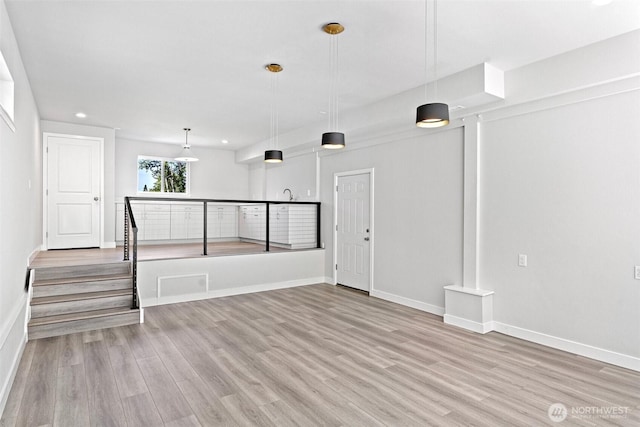 1120 156th Ave SE, Bellevue, WA 98007 - empty room featuring wood finished floors, recessed lighting, and baseboards