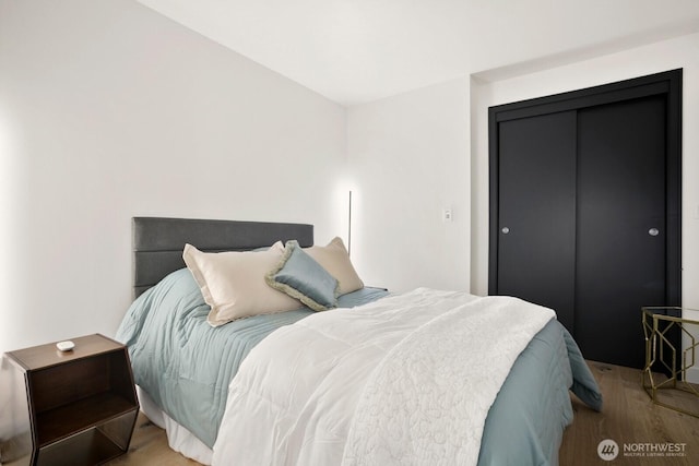 10650 NE 9th Pl Unit 3210, Bellevue, WA 98004 - bedroom with wood finished floors