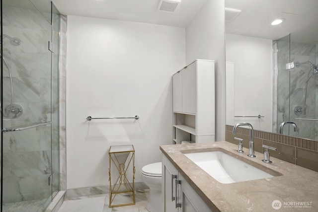 10650 NE 9th Pl Unit 3210, Bellevue, WA 98004 - bathroom with vanity, a shower stall, toilet, and recessed lighting