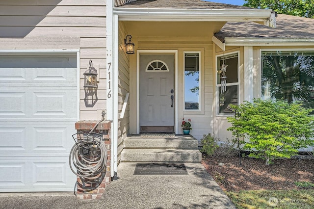 7116 193rd St E, Spanaway, WA 98387 - doorway to property featuring roof with shingles