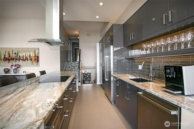 2021 1st Ave Unit G4, Seattle, WA 98121 - kitchen with stainless steel appliances, a sink, ventilation hood, backsplash, and light stone counters